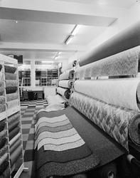 teppeforretning, interiør, tepperuller