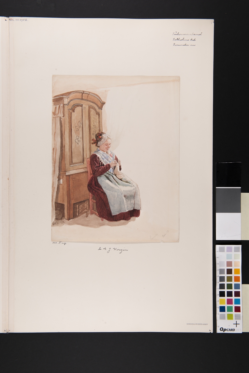 Dräkt. Handarbetande kvinna i helfigur sittande  framför ett skåp. Akvarell i storformat föreställande  av A.J.G Virgin