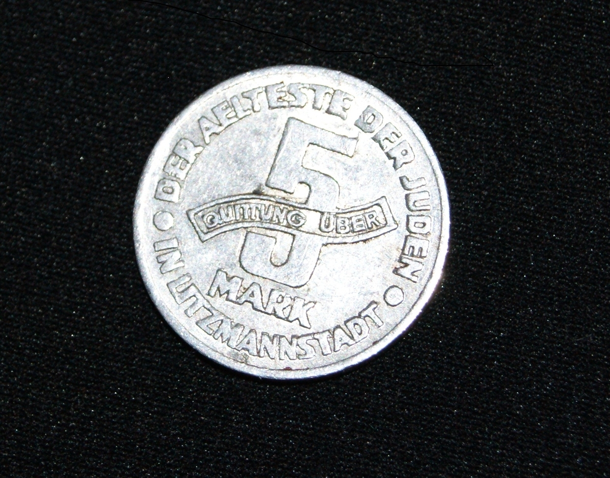 Mynt från gettot i Lodz, med tyska texten "Der aelteste der juden. In litzmannstadt. 5 mark. GETTO 1943"