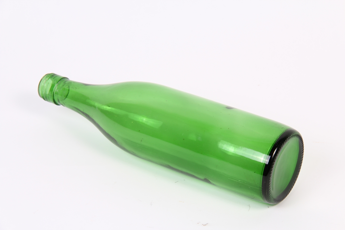 Grøn glasflaske.