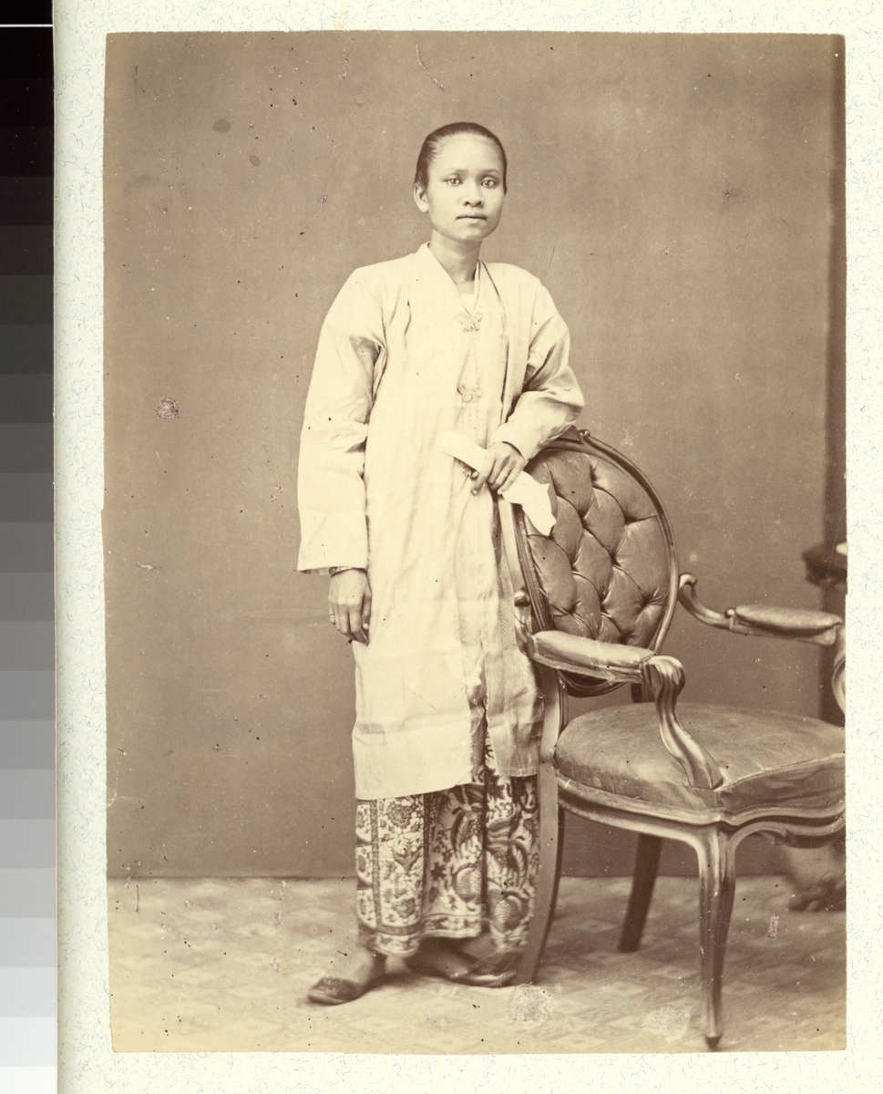 Bilden visar en malajisk kvinna.