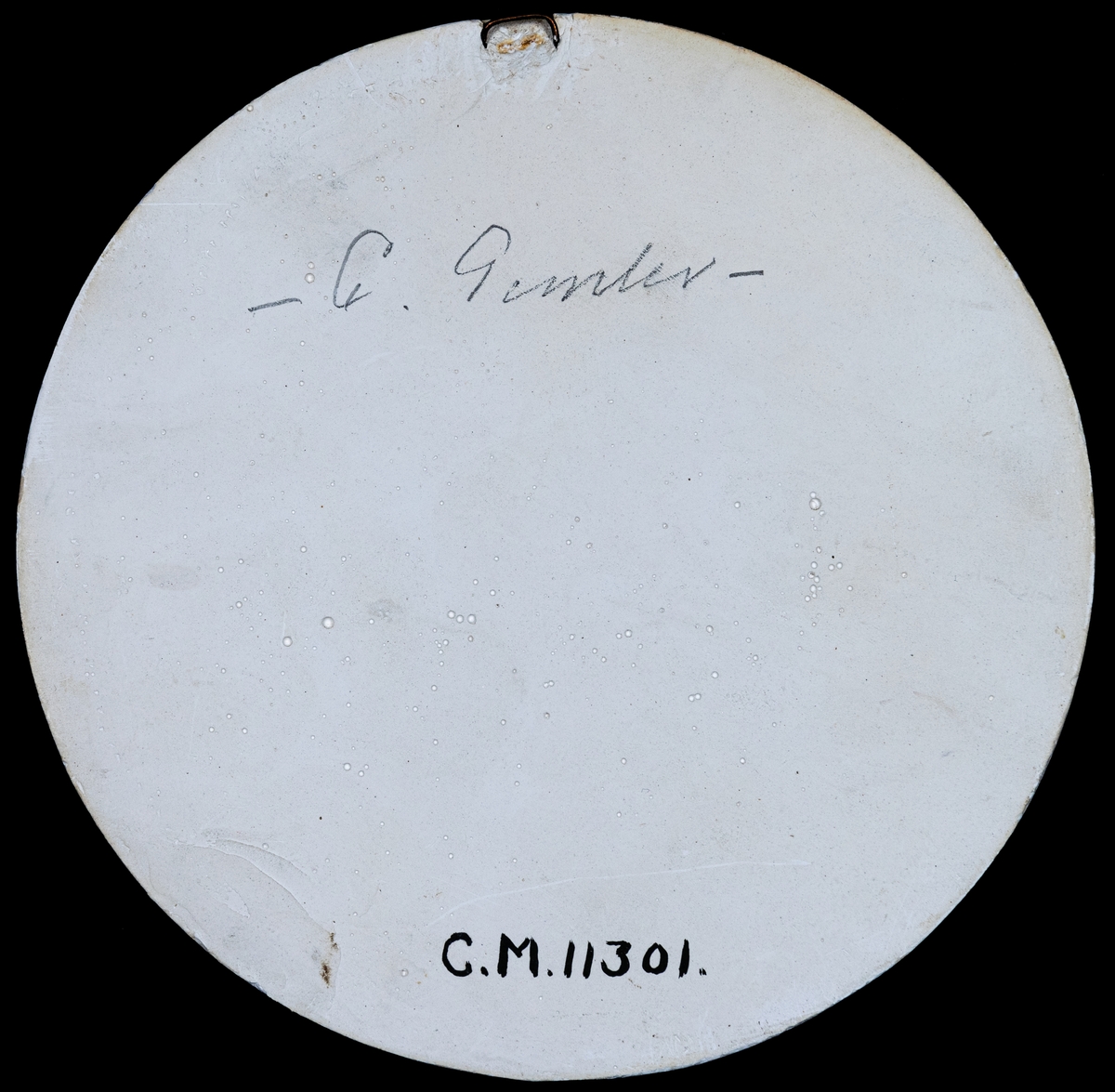 Porträttrelief, C. Gemler.
Signerad Runer 1931.