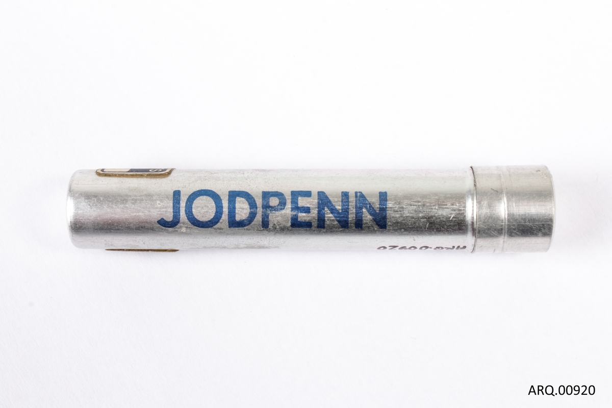 Sylinderformet beholder til oppbevaring av jodpenn.