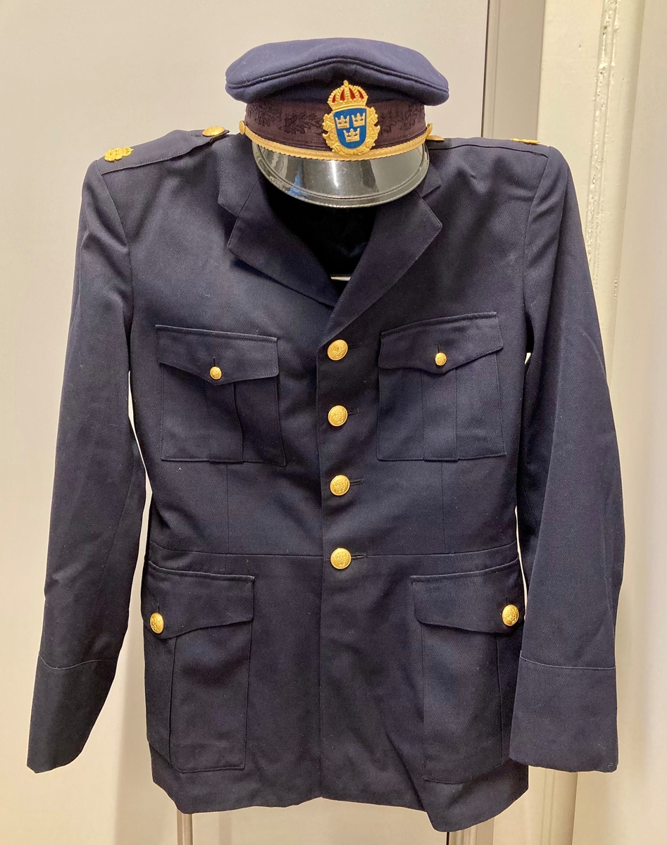 Uniformsjakke for svensk politi. Mørkeblå med gullfargede metallknapper.