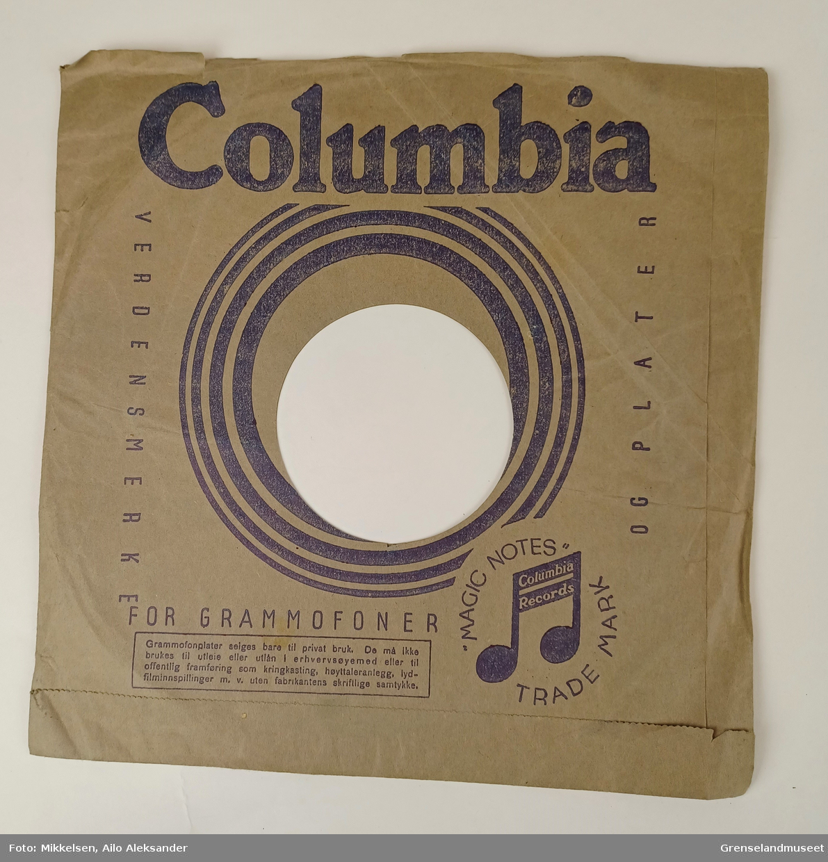 Plate: Columbia overskrift og illustrasjon. 
           Magic Notes logoen som er en note.
