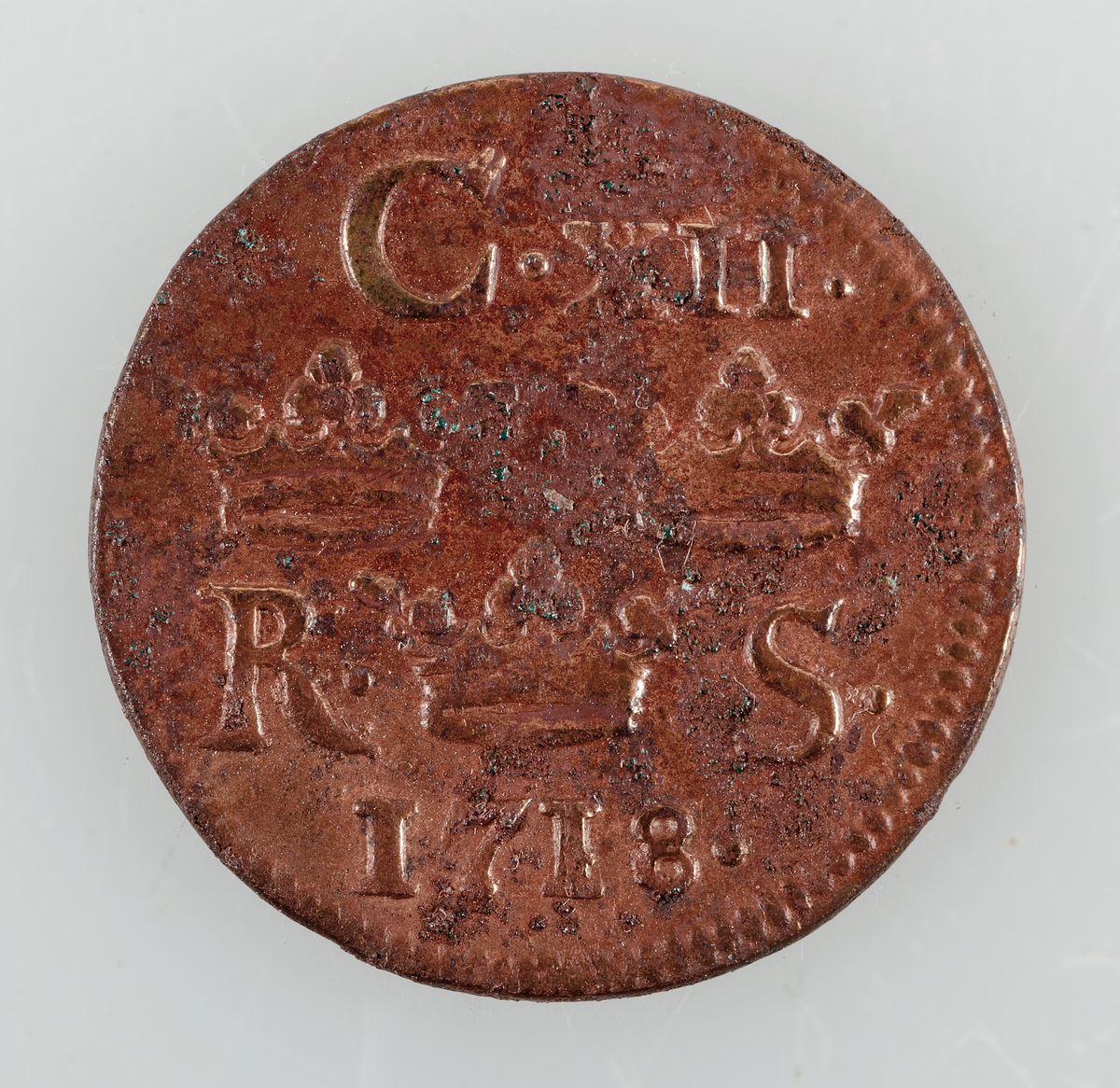 Mynt. 1/6 öre SM, 1718 (Karl XII), präglat i Avesta.