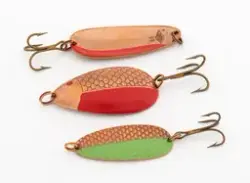 Tre «KAR-sluker» – fiskesluker som er produsert av edelmetal