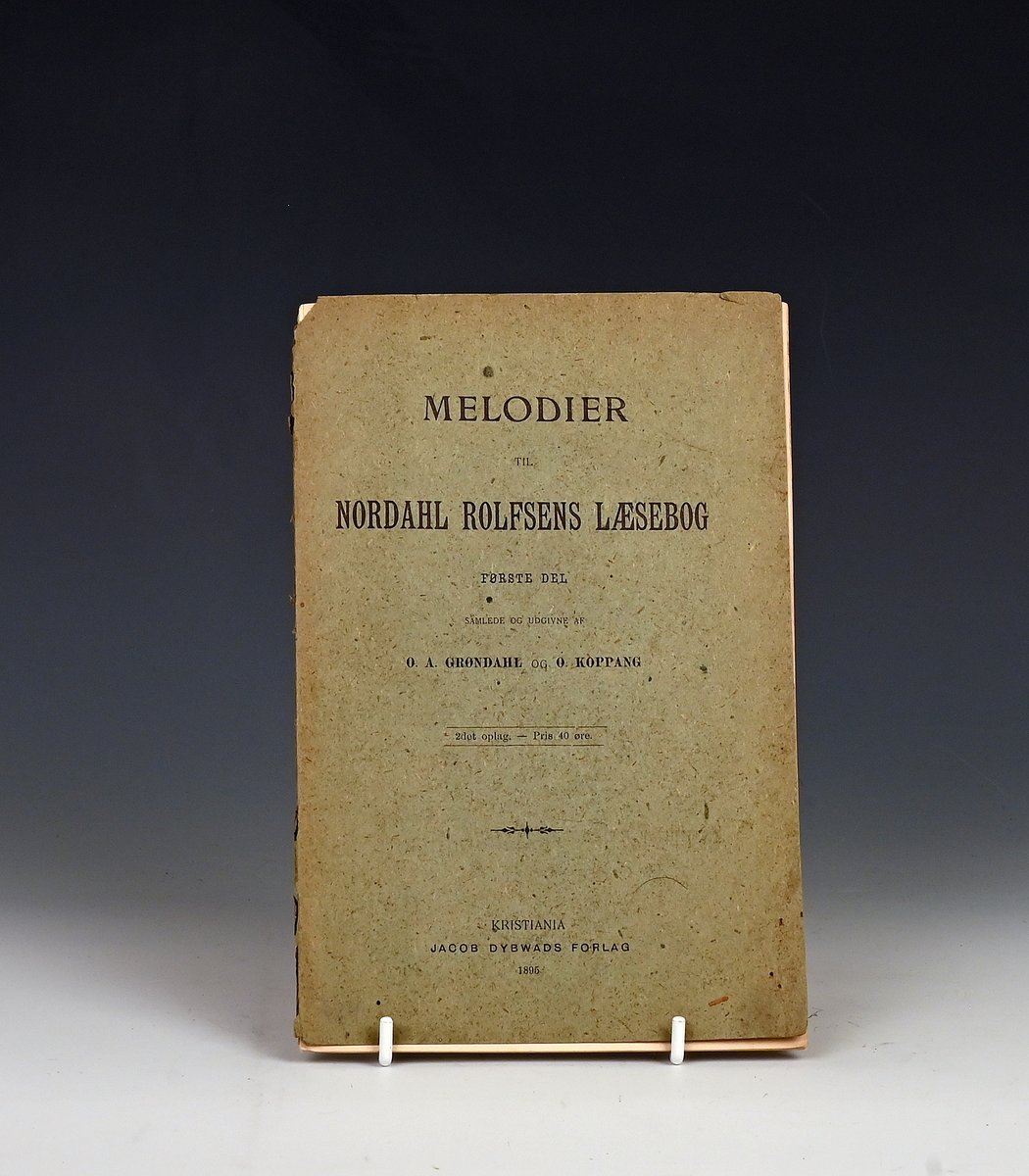 Grøndahl, O. A. Koppang, O. Melodier til Nordahl Rolfsens læsebog. Første del. Kr.a. 1895.