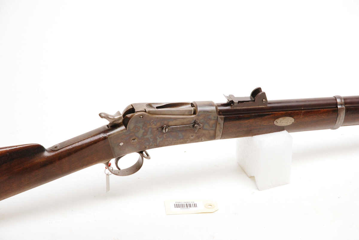 Dette er et 12 mm prøvegevær fra omkring 1873/ 1874 med en tidlig type magasinavstenger.