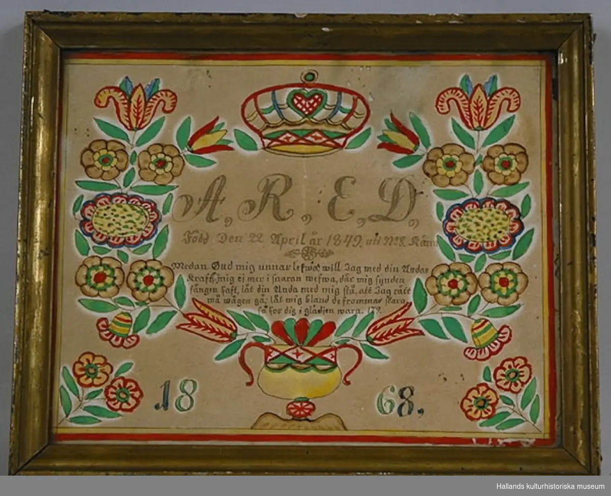 Födelsetavla, märkt: "A. R. E. D.", "Anna Regina Elidotter. Född Den 22 April år 1849 uti no 8 Kärra". Akvarell i grönt och rött. Bronserad träram.
