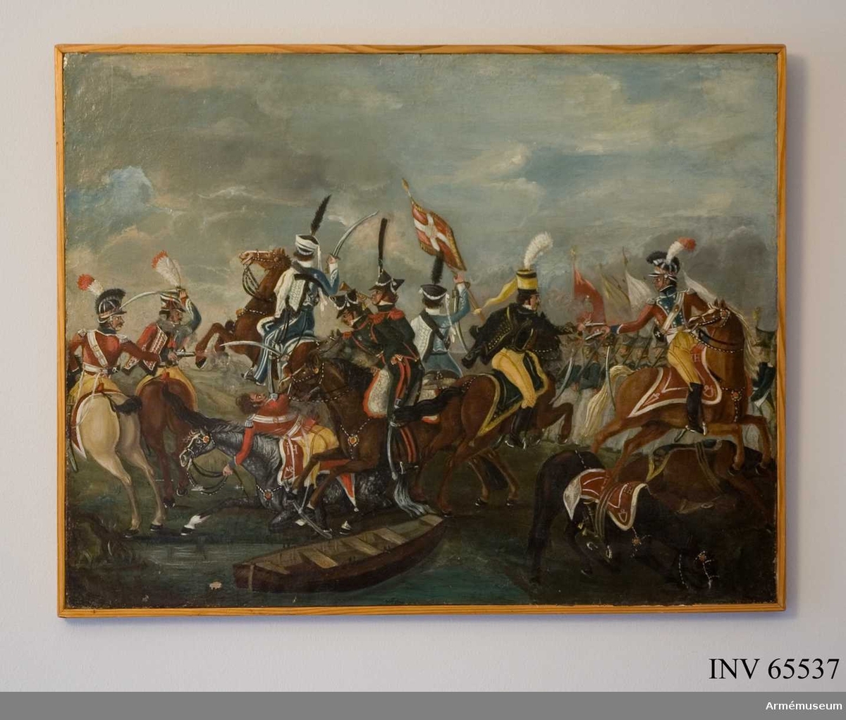 Grupp M I.
Målning föreställande "Dansk-svensk kavalleristrid, 1800-talets början". 3 st liknande målningar Svea livgarde 1968.