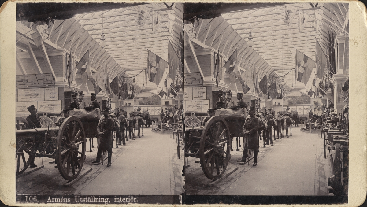 Stereobild med motiv från Allmänna Konst- och Industriutställningen i Stockholm 1897
"106. Arméns utställning. Interiör".