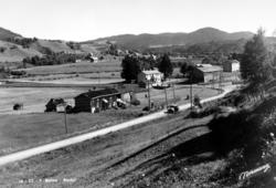 Postkort fra Bolme i Rindal kommune, hvor vi ser bygden med 