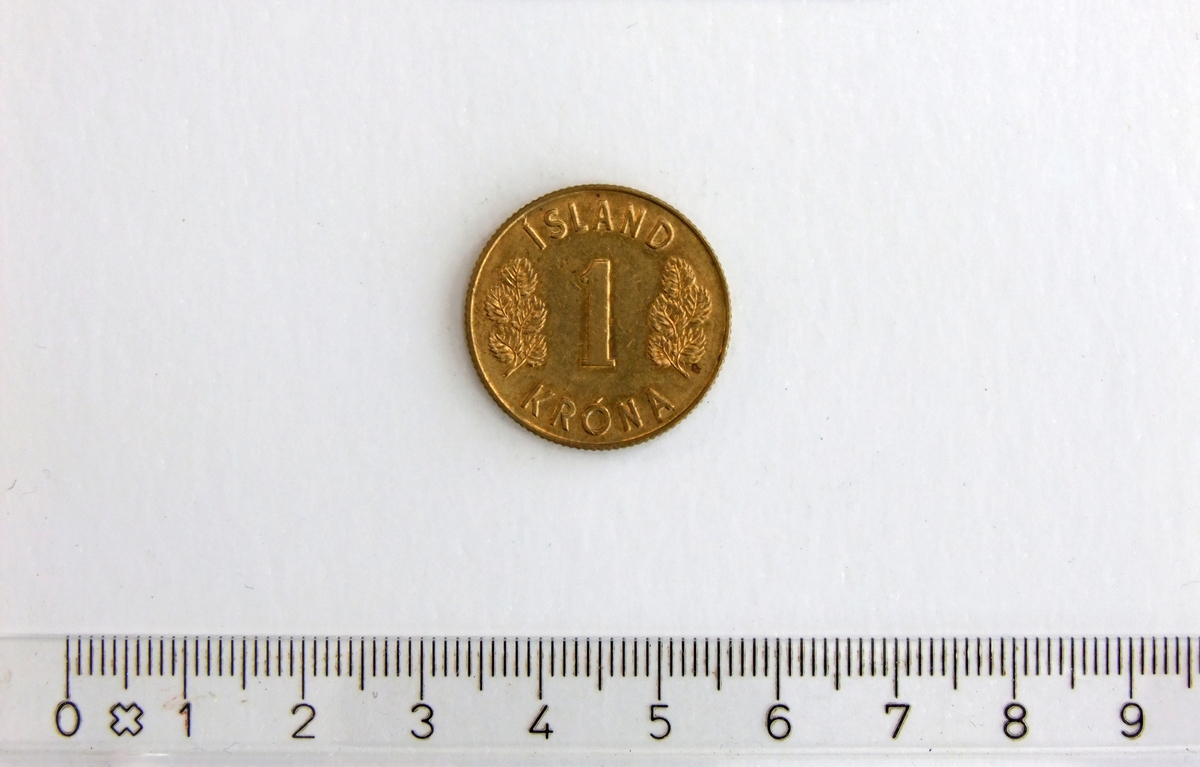 1 Króna,  ISLAND,  1973,  Nikkel-Messing.

Form:  Sirkulær