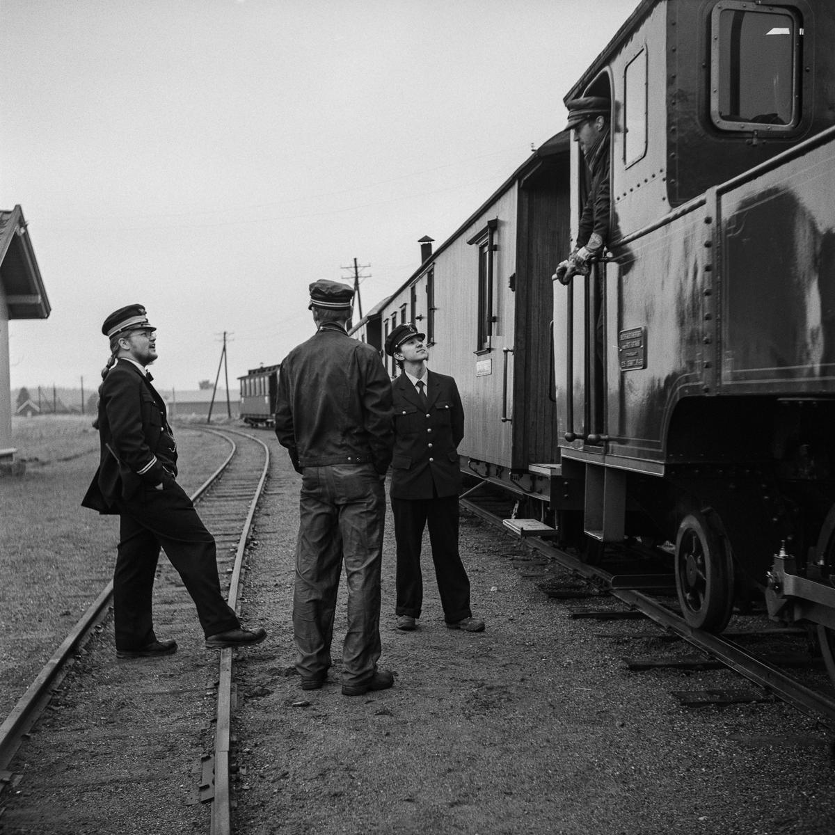 Fire mannlige frivillige i tjeneste på Fossum stasjon