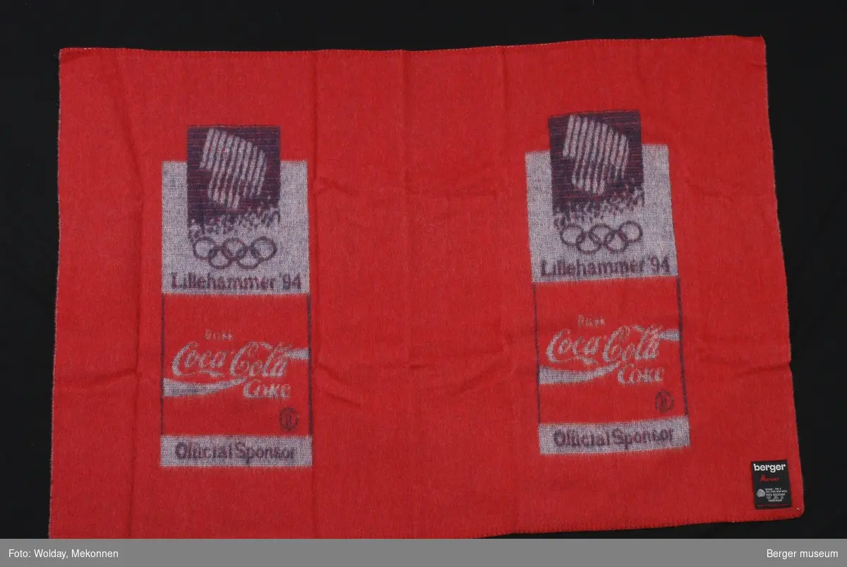 Lite ullpledd med OL Lillehammer, OL-ringer Coca Cola logo, og Official Sponsor.
Møllsikret. 