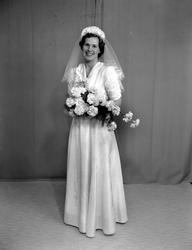 Foto av en brud. Det er ukjent hvem vi ser på bildet. Fra No