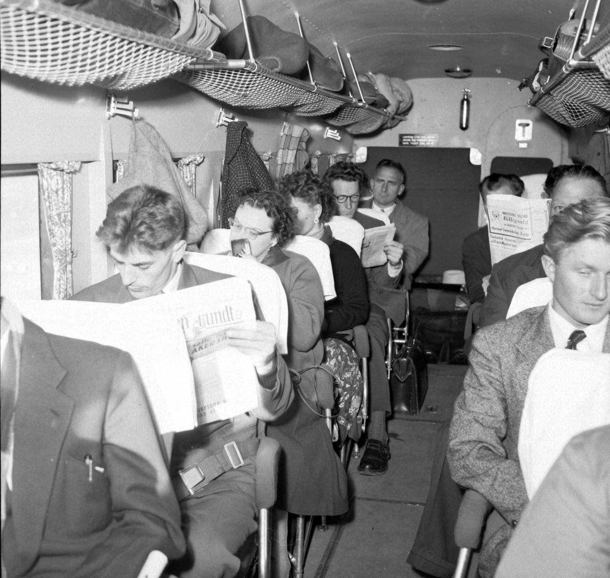 Passasjerer i kabinen på SAS' sjøfly "Askeladden".