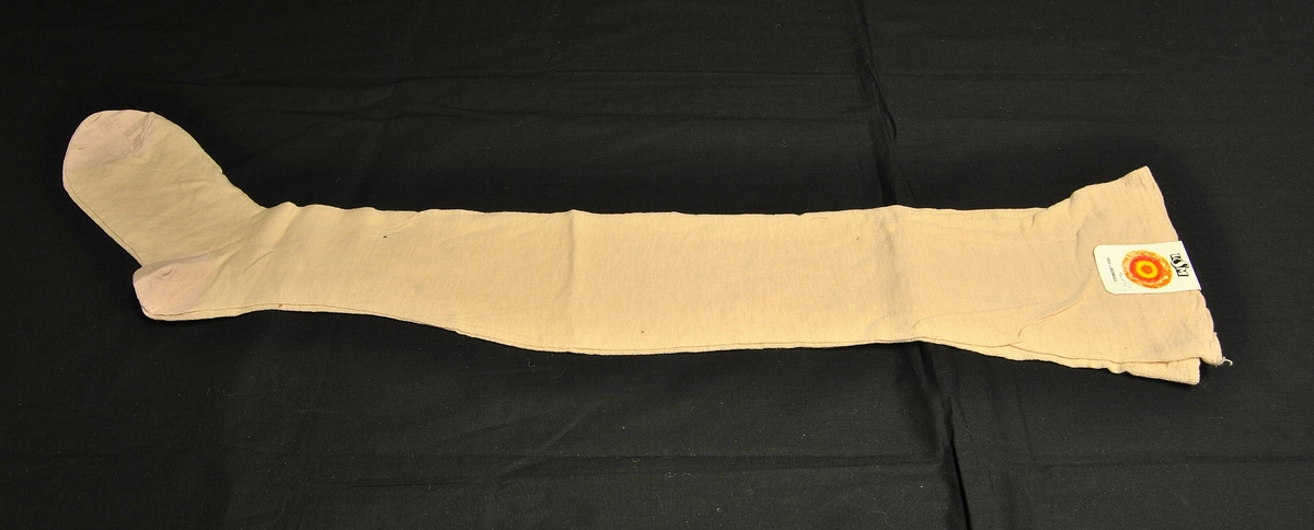 Ubrukte, lårlange strømper.