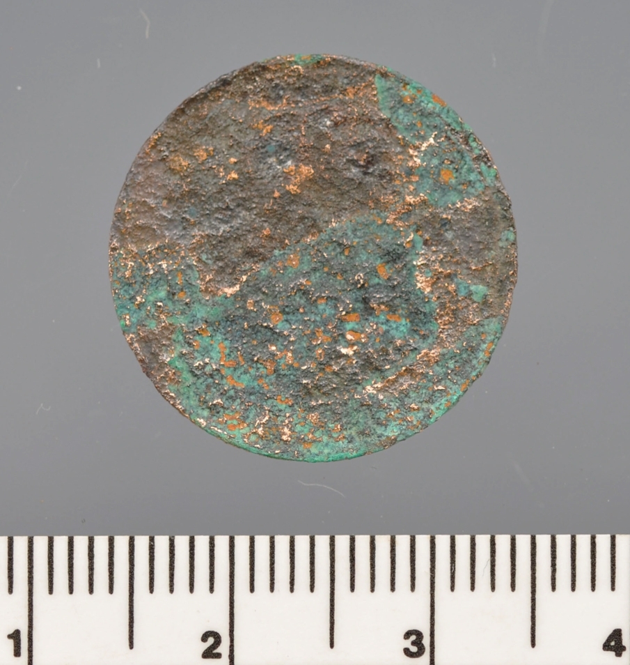 Mynt i metall funnet i Vågen i Bergen.