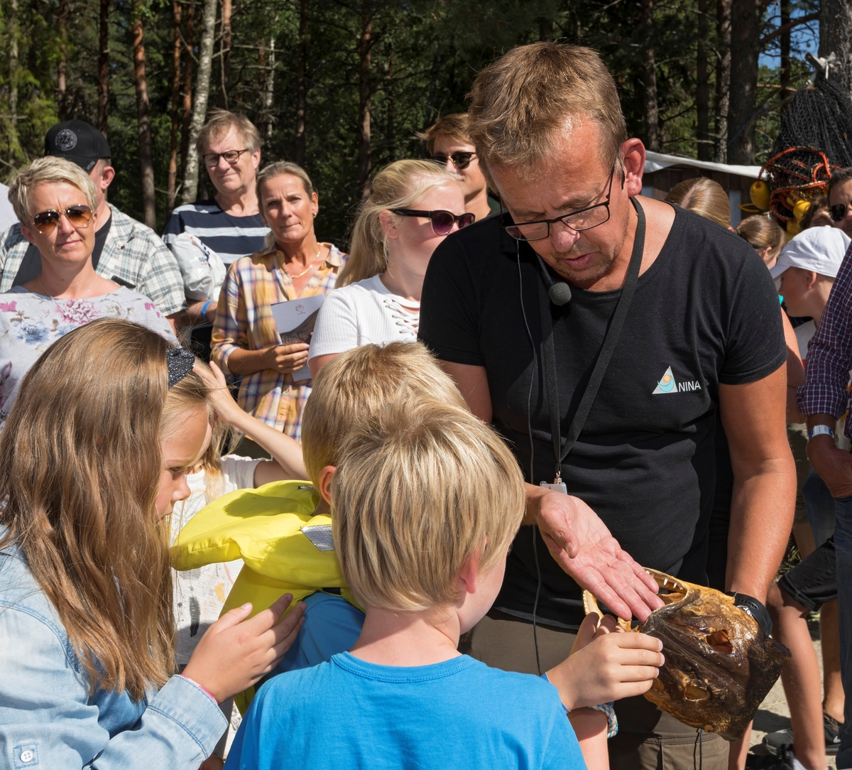 Jon Museth fra NINA forteller om fisk fra Glomma etter opptak fra storrusa på Innlandsfisketorget på Prestøya under De nordiske jakt- og fiskedager 2018 på Norsk skogmuseum, Elverum, Hedmark.
