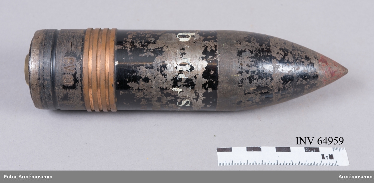 Grupp F II.
6 cm tom, pansarbrytande granat m/1899 till räfflad bakladdningsmateriel.