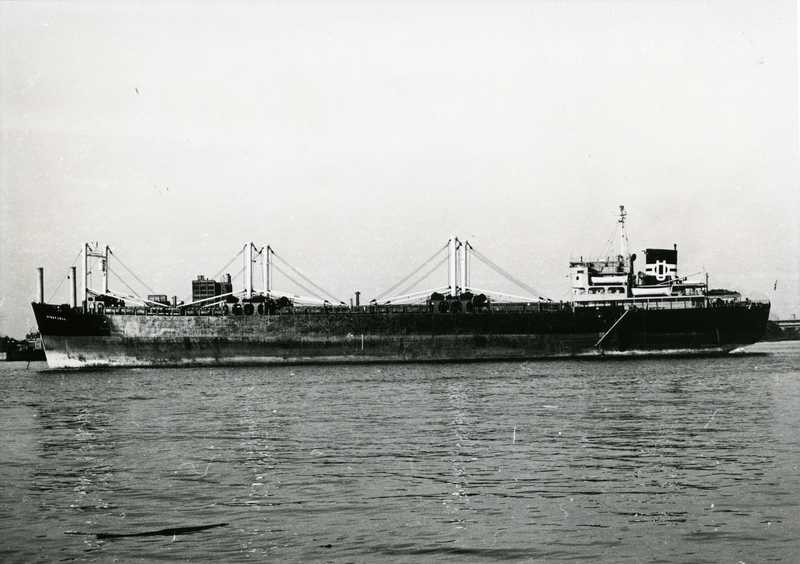 M/S «Etnefjell» (b.1950) ligger for anker i ukjent havn september 1968