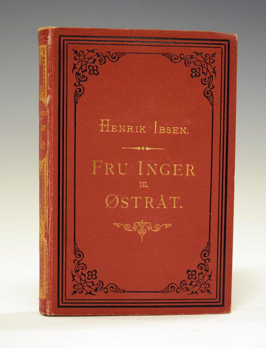 Ibsen, Henrik: Fru Inger til Østråt. Brunt helshirtingsbind med preget dekor i gull og sort, helt gullsnitt. 
Andre utgave 1874.