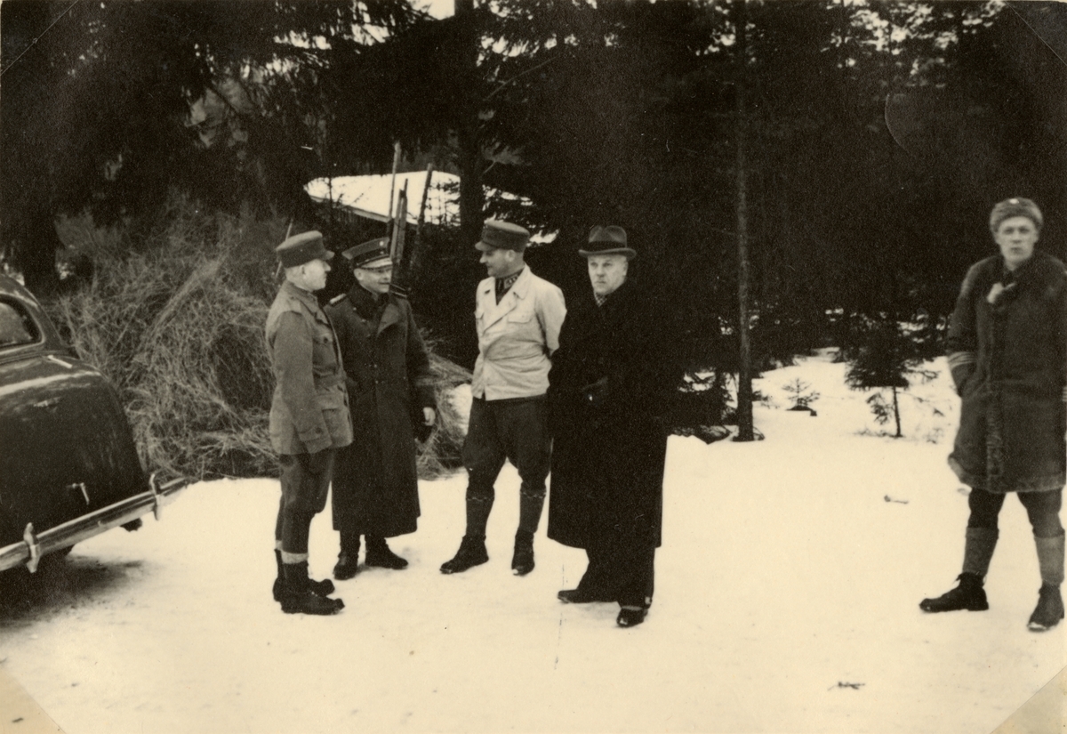 Text i fotoalbum: "Studieresa med general Alm till Finland 1.-12. mars 1939. Finska försvarets spetsar, generalstabschefen Oesch, general Sarlin, general Österman, försvarsministern Niukkanen."