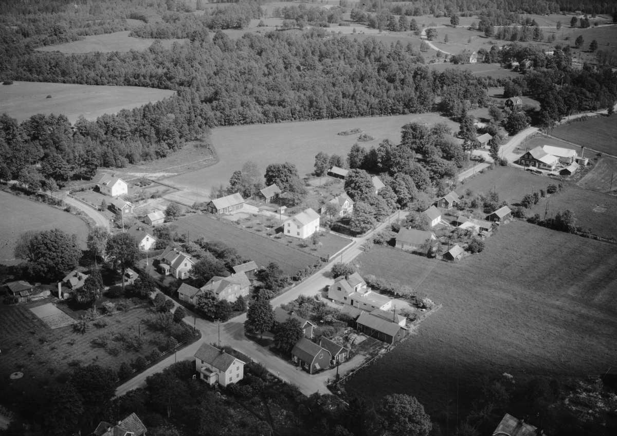 Flygfoto över Näshult i Vetlanda Kommun, Jönköpings län. Nr: 932/1961