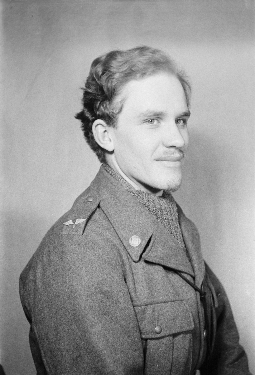 Porträttfoto av oidentifierad soldat vid F 19, Svenska frivilligkåren i Finland under finska vinterkriget, 1940.