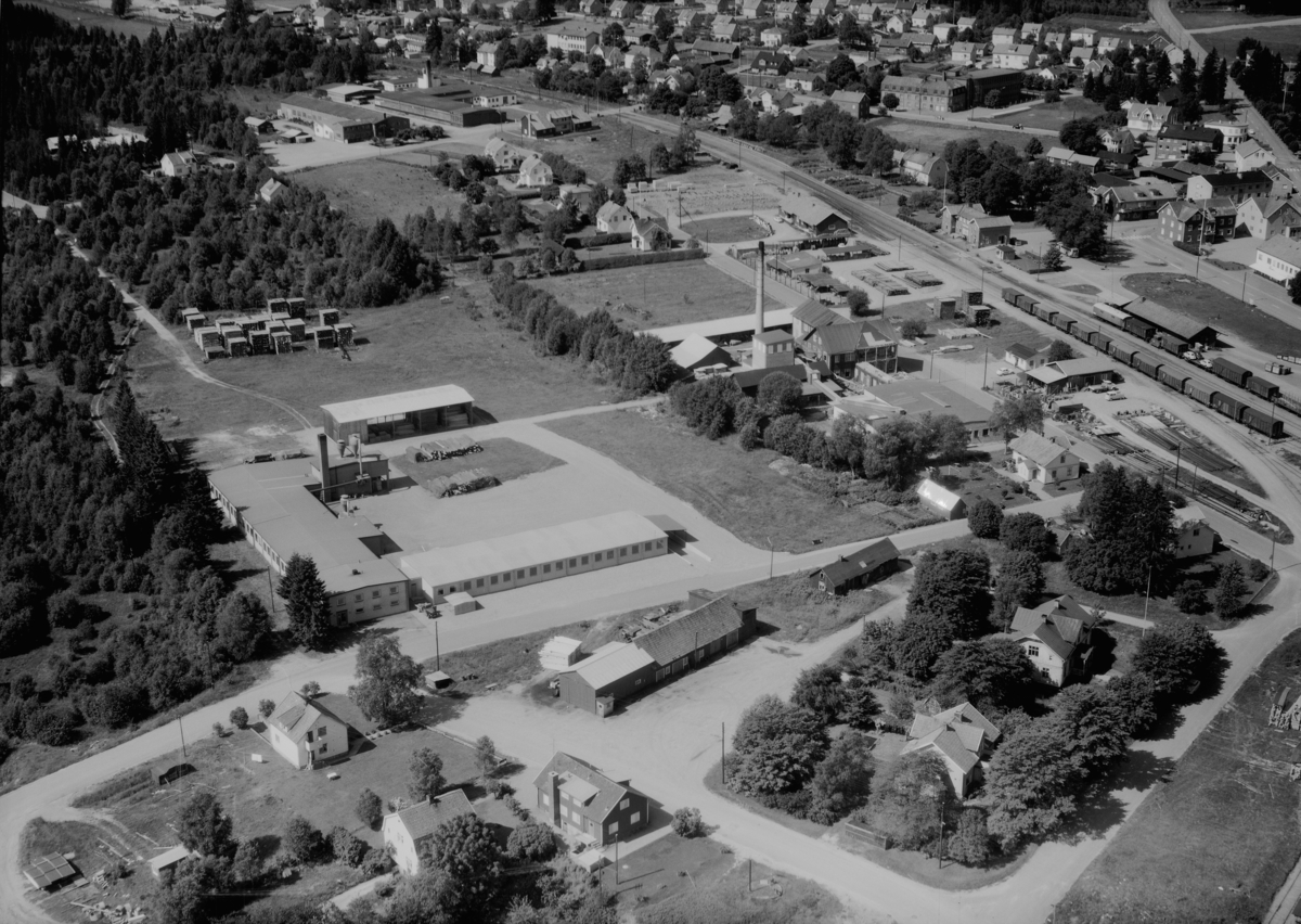 Flygfoto över Smålandsstenar i Gislaveds kommun,  Jönköpings län. 1234/1964