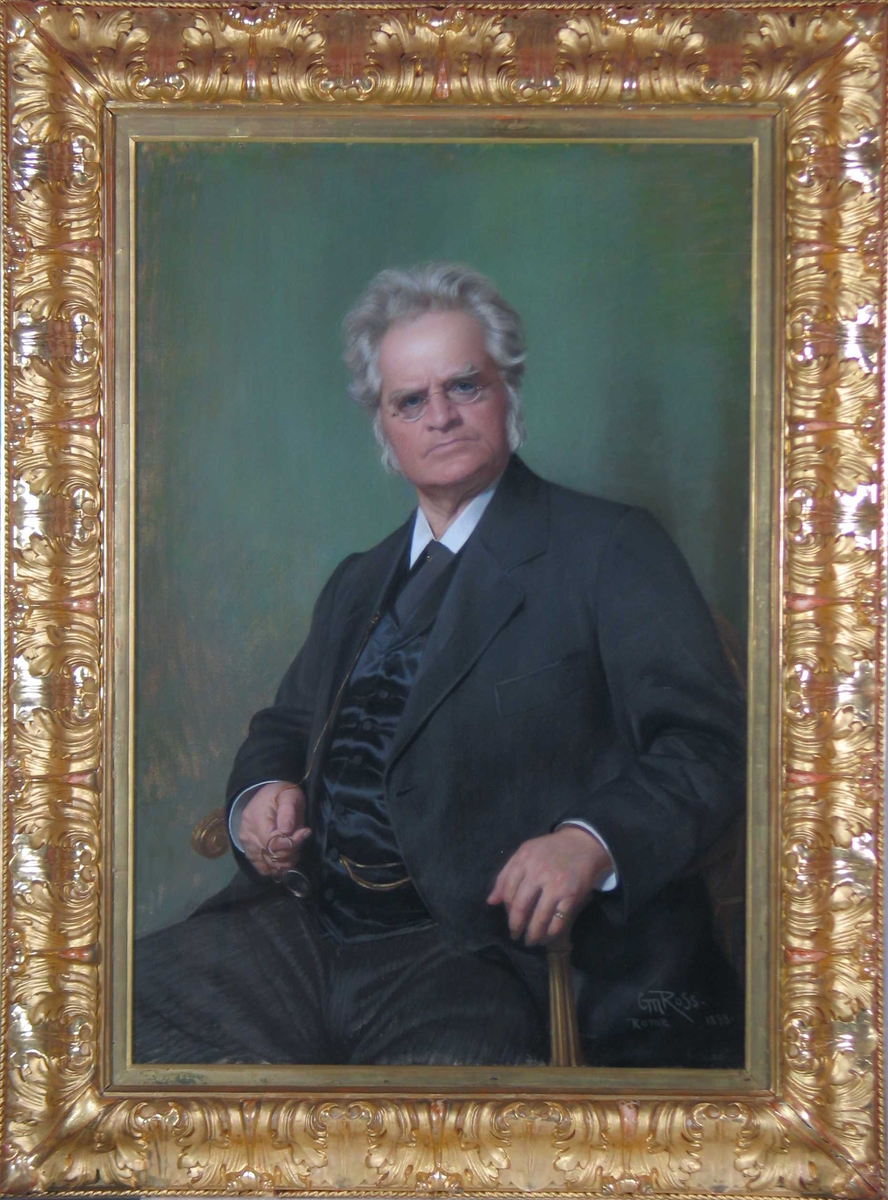 Portrett av Bjørnstjerne Bjørnson sittende.