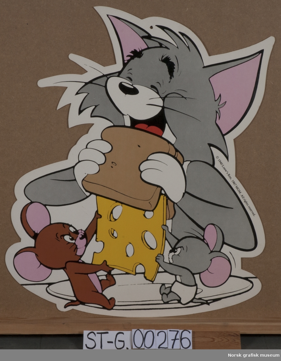 Reklam for ost med firgurene Tom og Jerry.