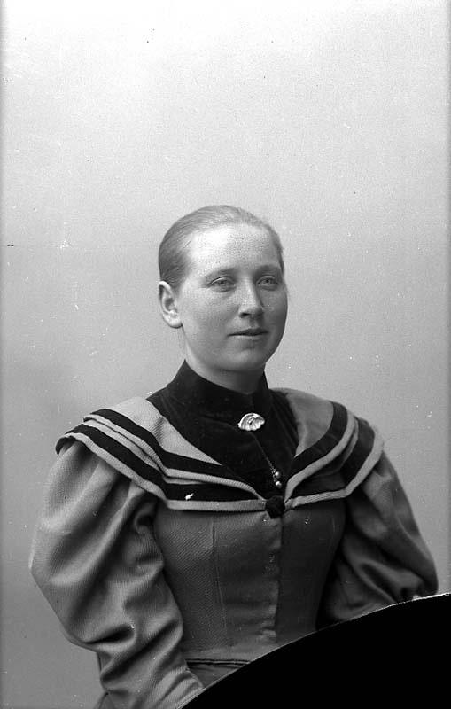 En kvinna.
L. Gustafsson