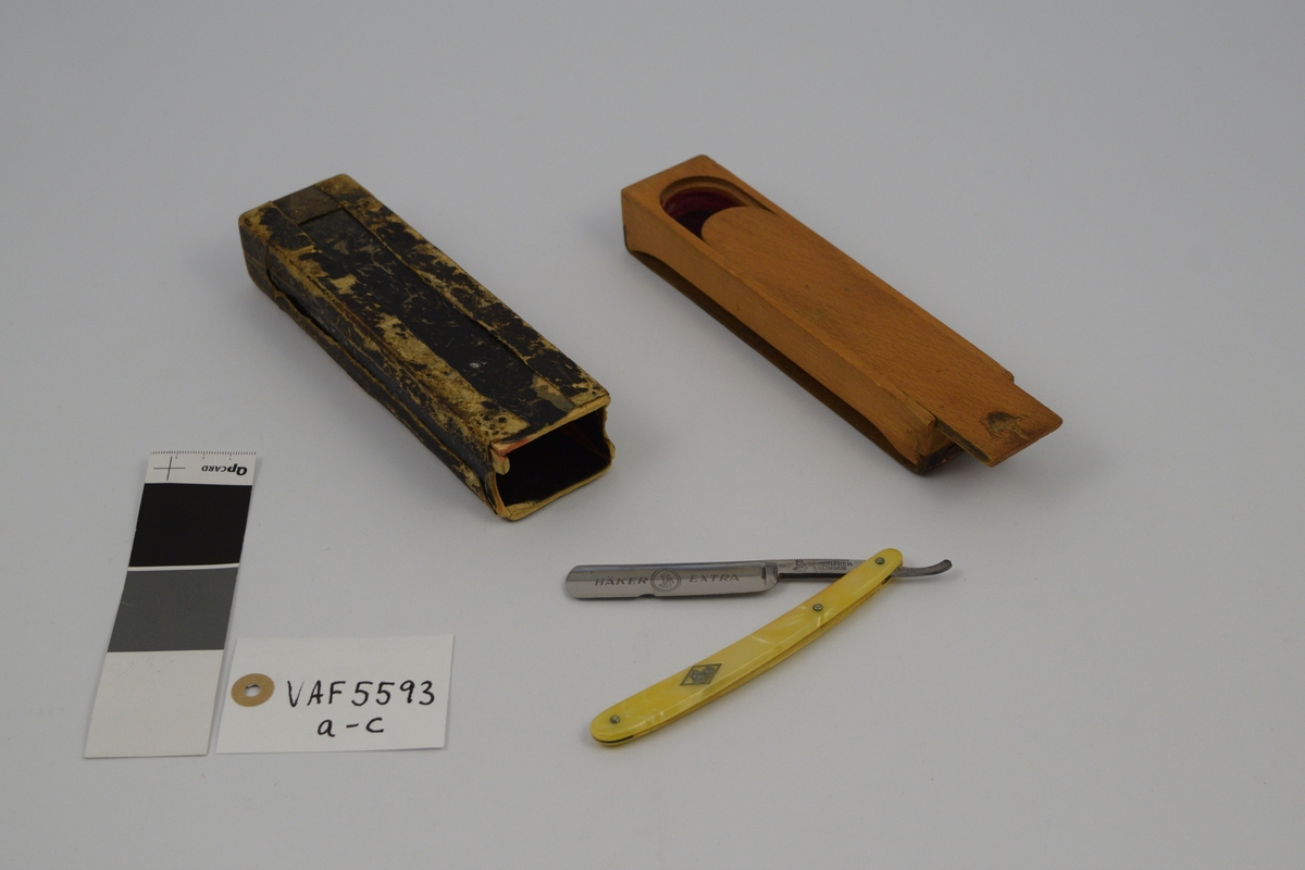 Fabrikkmerke: parallellogram /sirkel eller uten ramme med : en mann i profil med hatt og hakke over skulderen.