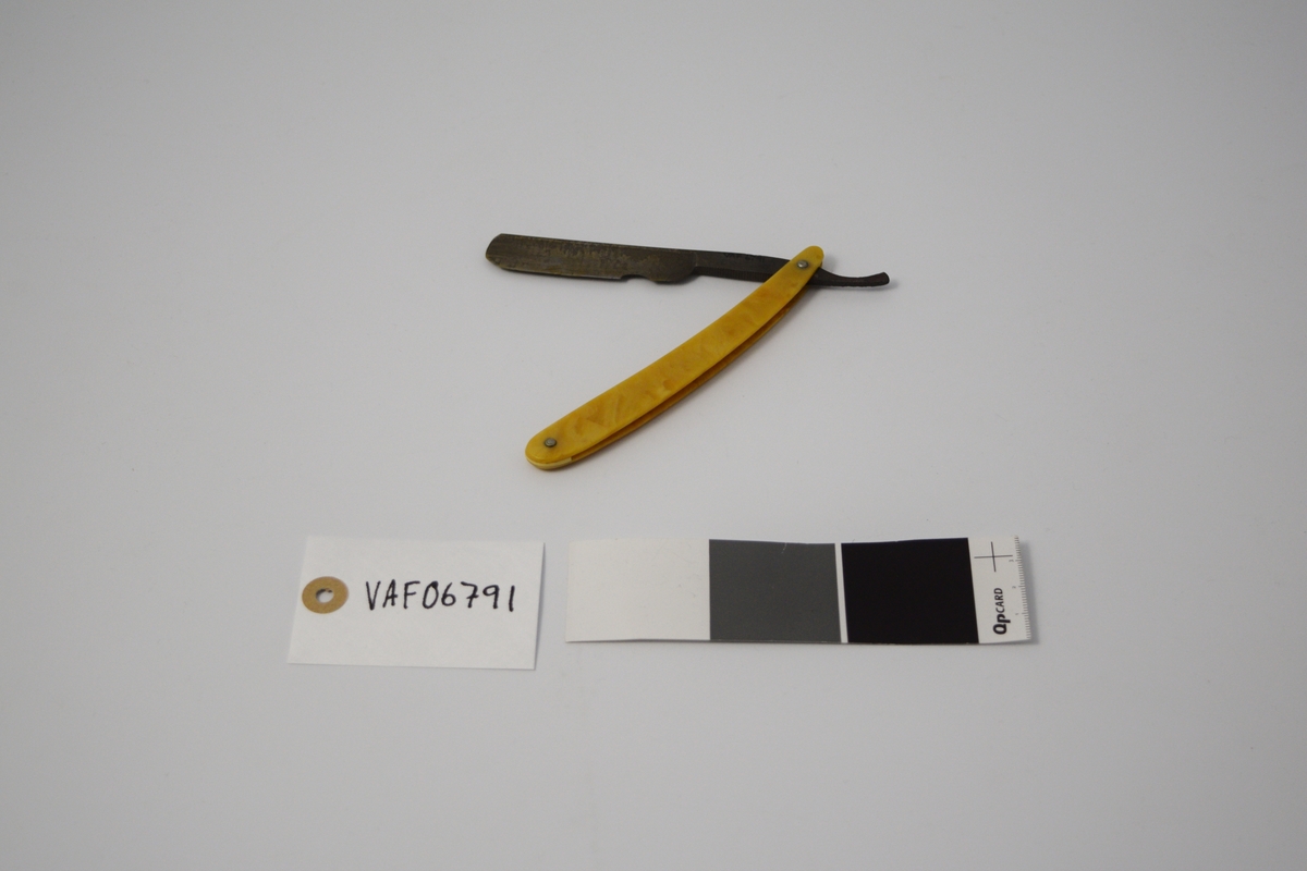 Skaftet skal illudere treverk.