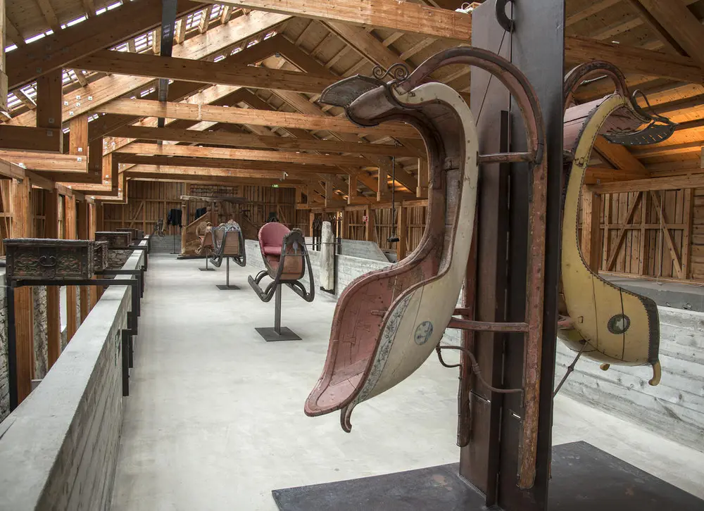 Ols sleighs erected as moon rockets in the farm exhibition by Sverre Fehn in Storhamarlåven.