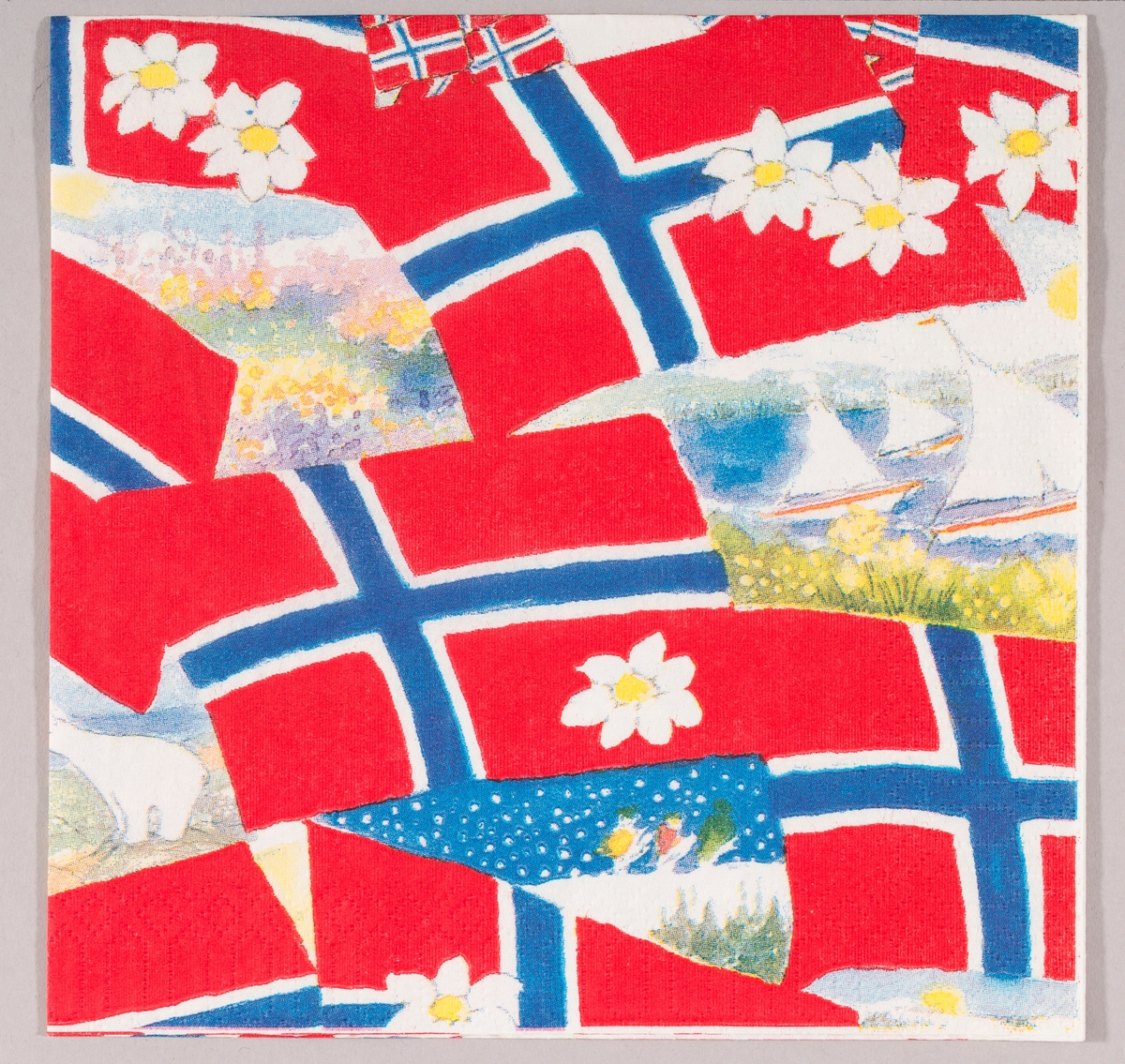 Norske flagg, hvite blomster og motiver med sommerlandskaper, båter i sjøen og vinterlandskaper.