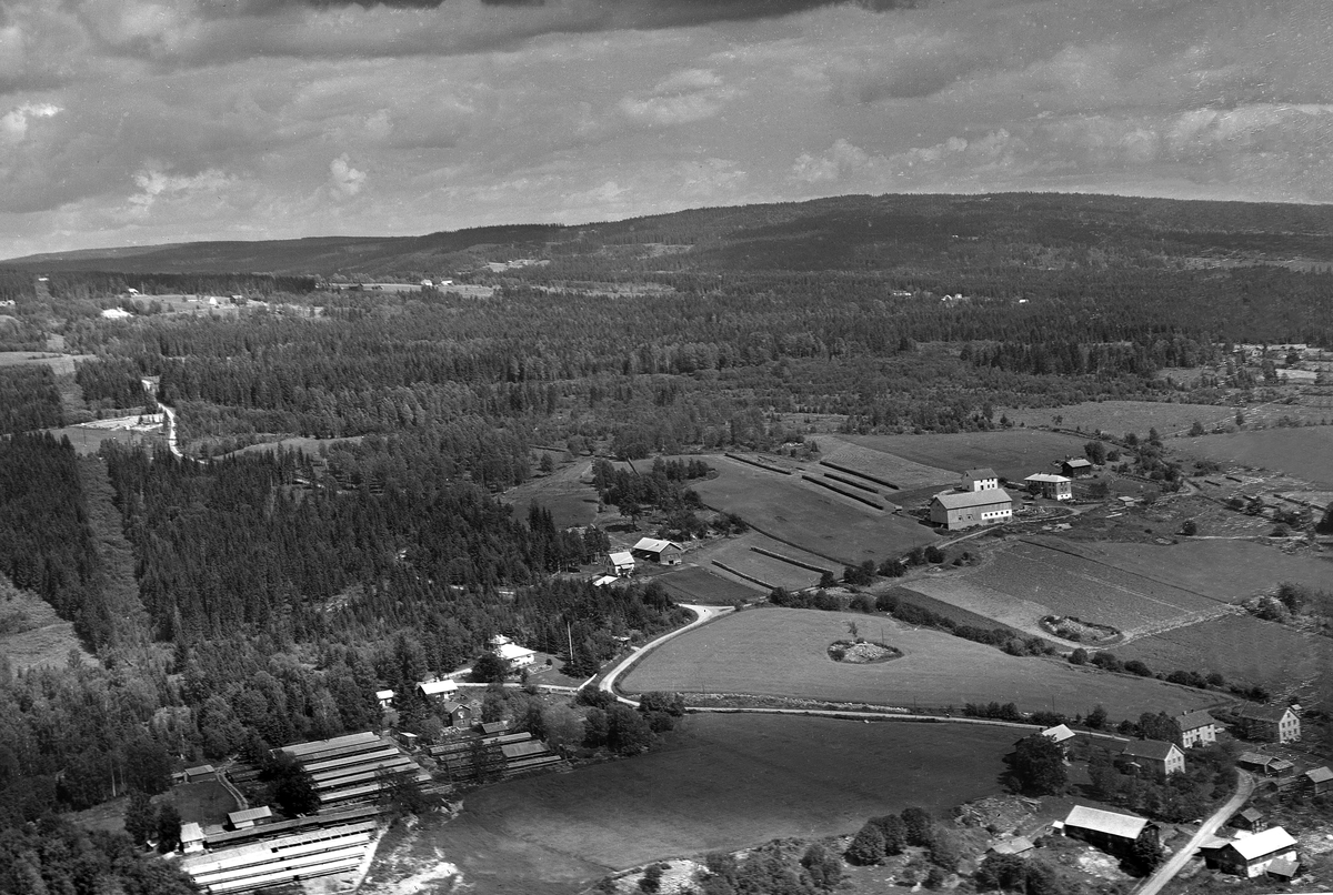 Kirkeby. Stor-Kylstad-gardene nederst i høyre hjørne, flyfoto, landskap, Furnes.