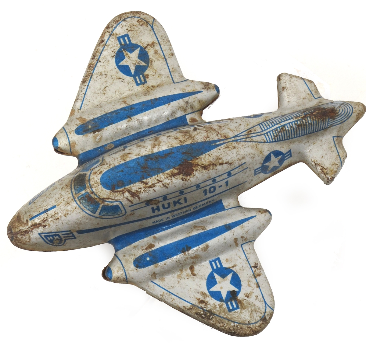 Lekefly av metall, satt sammen av to hoveddeler, utstanset og presset i form, overside og underside som er montert sammen. Grå og blå farge.  Stjerne og striper.  US Air Forse.