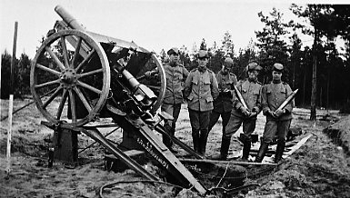 Kanon m/1902. 7,5 cm, skjutning på bockar.