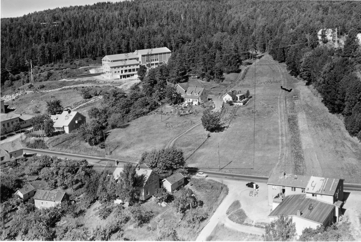 Flyfotoarkiv fra Fjellanger Widerøe AS, fra Porsgrunn Kommune. Heistad. Fotografert 08.08.1959. Fotograf J Kruse