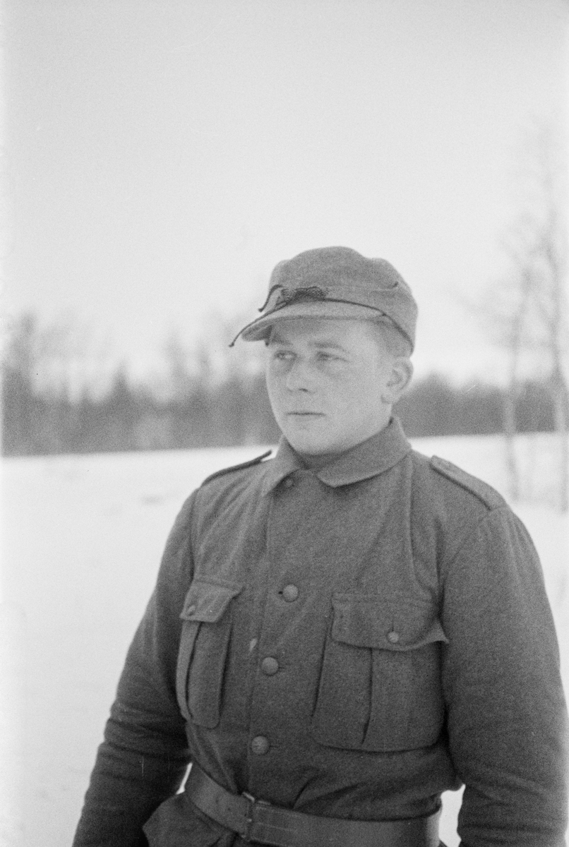 Porträttfoto av Matti Heltanen, finsk frivillig under finska vinterkriget. Bild från F 19, Svenska frivilligkåren i Finland, 1940.