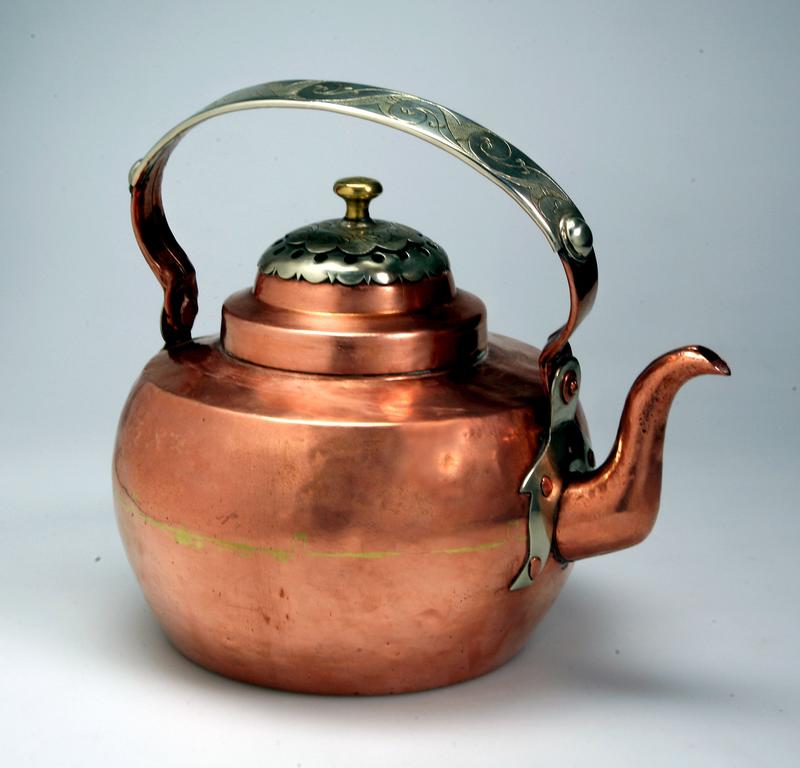 Copper coffee pot with beautiful engraving. Made during the interwar years. Nickel silver on the lid and handle.