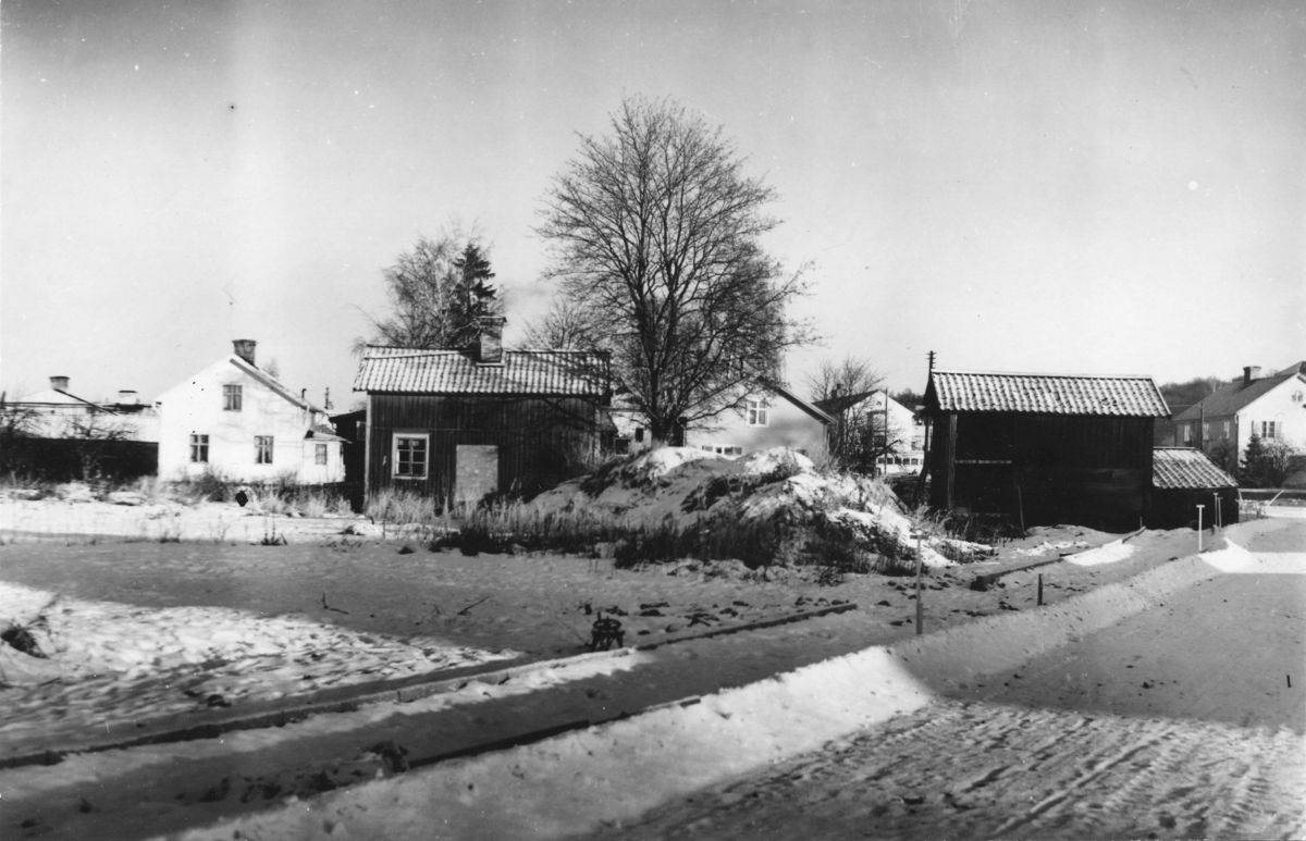 Stadsägan 214, Torggatan 35, vy från hörnet Westerlundsgatan - Fjärdhundragatan, Enköping, mot nordost