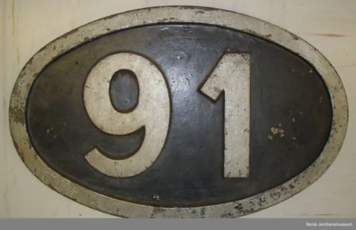 Nummerskilt fra NHJs damplokomotiv litra F nr. 91 / NSB damplok type 43a nr. 91